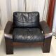 Pair of Scandinavian armchairs in leather and rosewood.