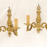 Pair of sconces in gilded bronze double candles