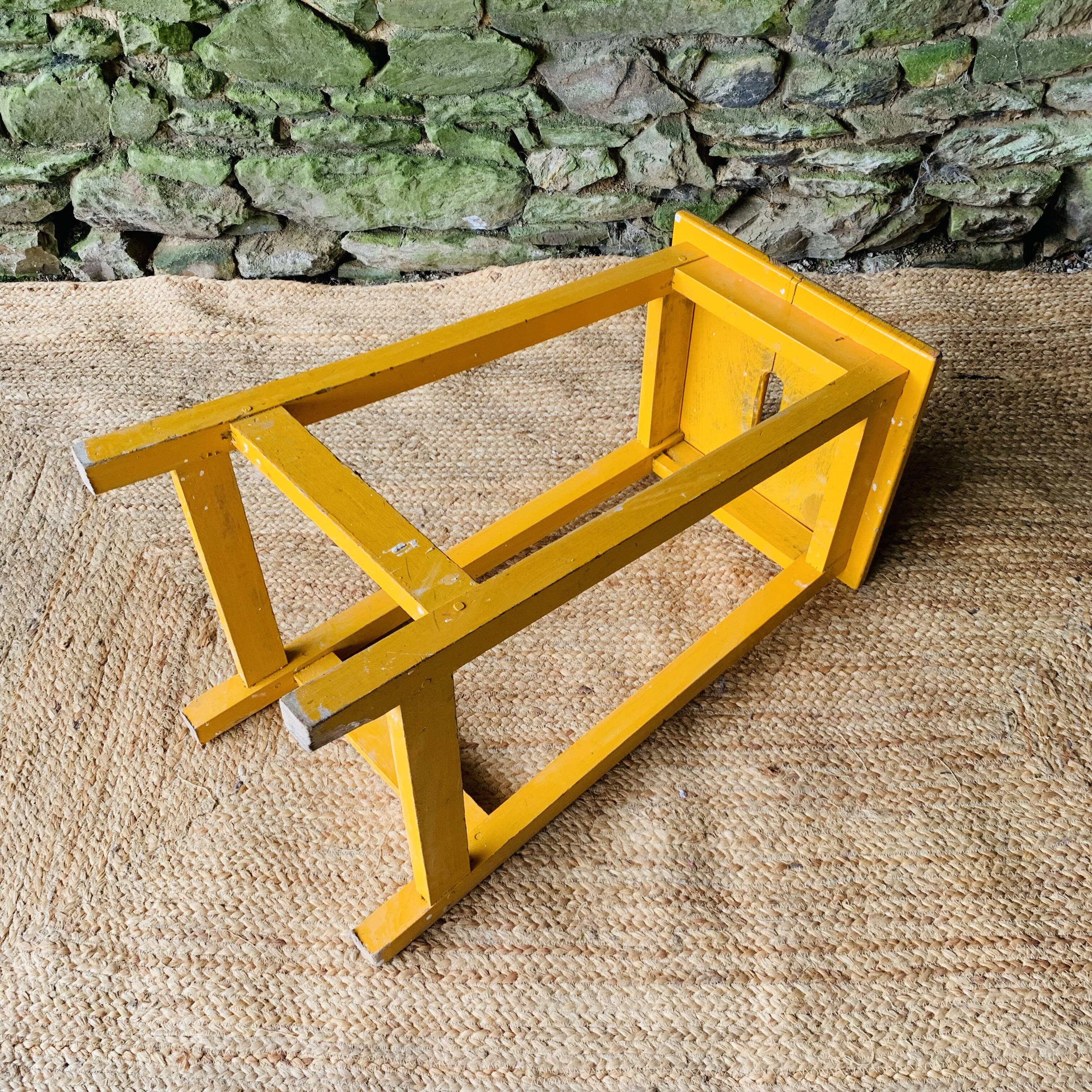 Yellow wooden high stool