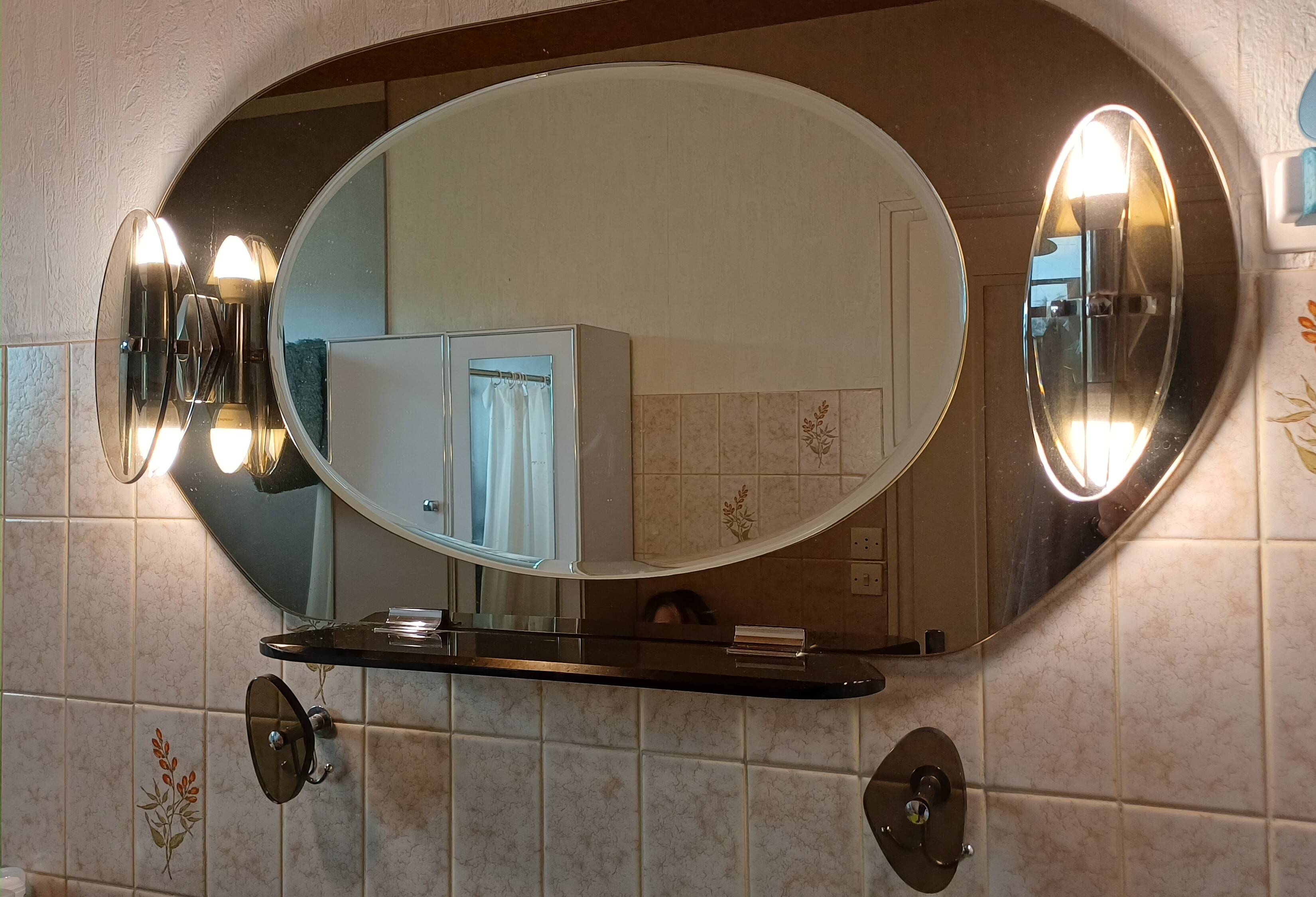 Vintage bathroom mirror with hooks