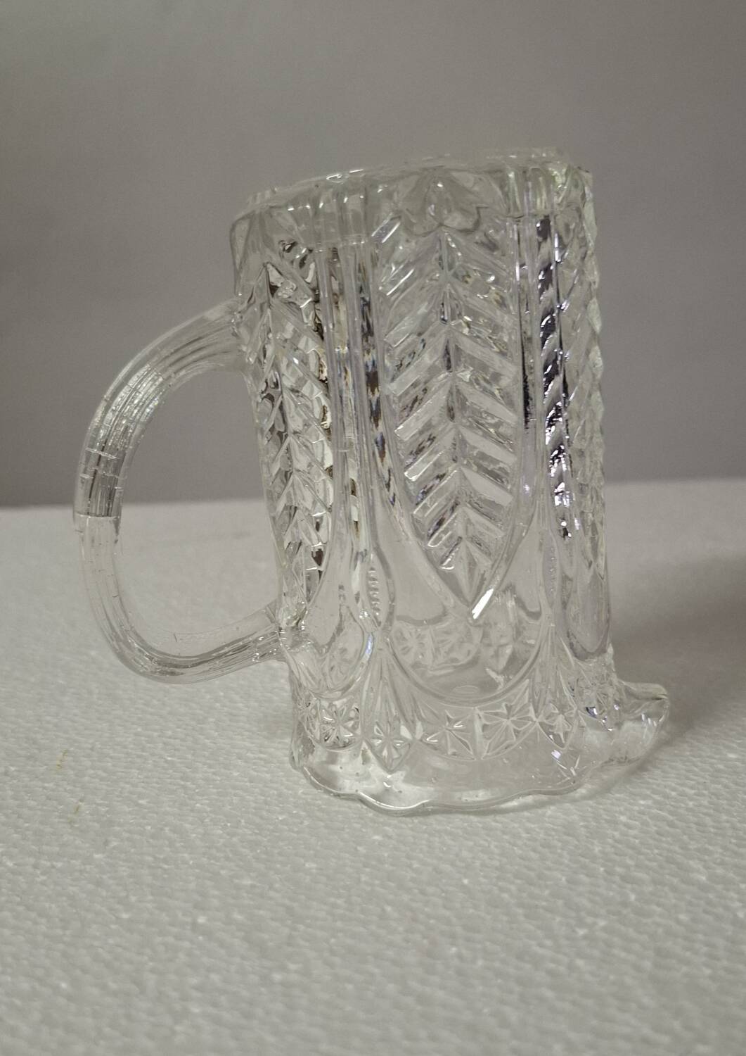 Moulded glass cream pot