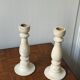 Pair of white wooden candlesticks