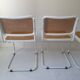 B32 chairs by Marcel Breuer in white.