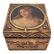 Old jewelry box in wood and gilded stucco