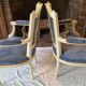 Pair of Louis XVI cabriolet armchairs in cream and blue French elegance late 19th century