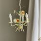 Small vintage cream metal flower chandelier with orange flowers and 3 arms.