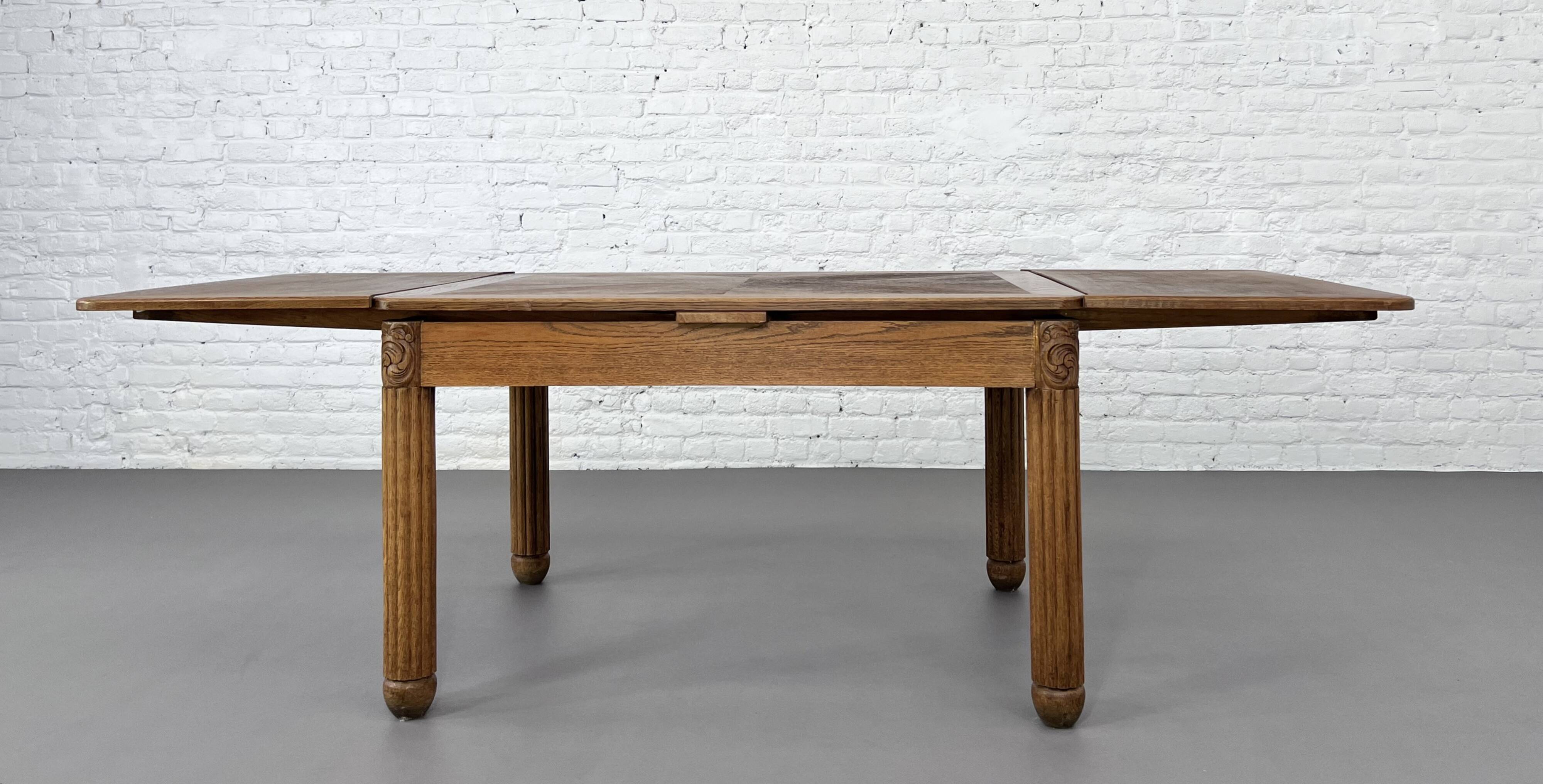 Rectangular dining table in oak and extendable early twentieth century