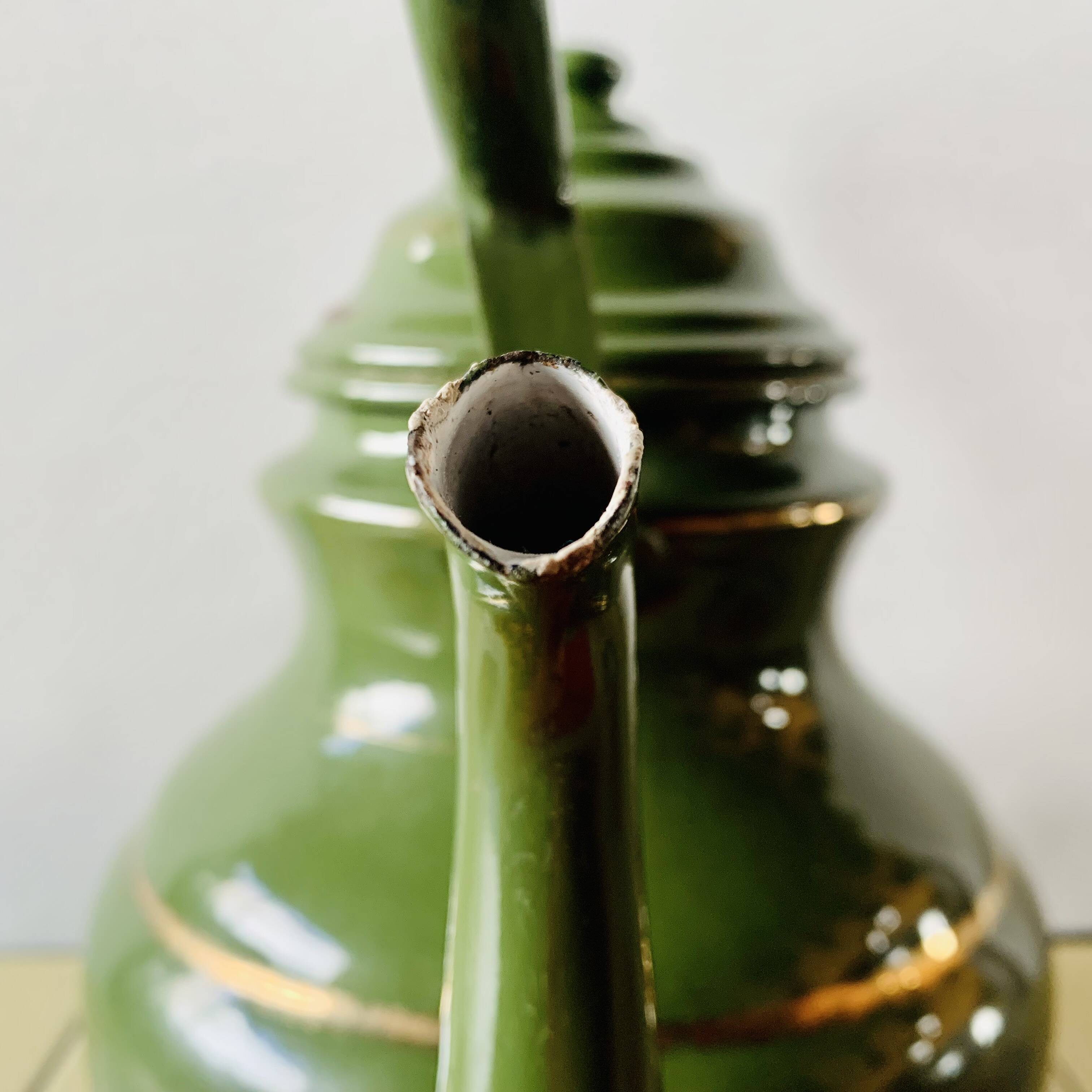 Vintage green enameled sheet metal kettle