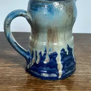 Blue flamed stoneware jug