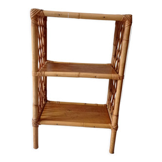 Old shelf on vintage rattan stands