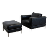 Fauteuil et ottoman IKEA Arild vintage en cuir noir pleine fleur et base chromée