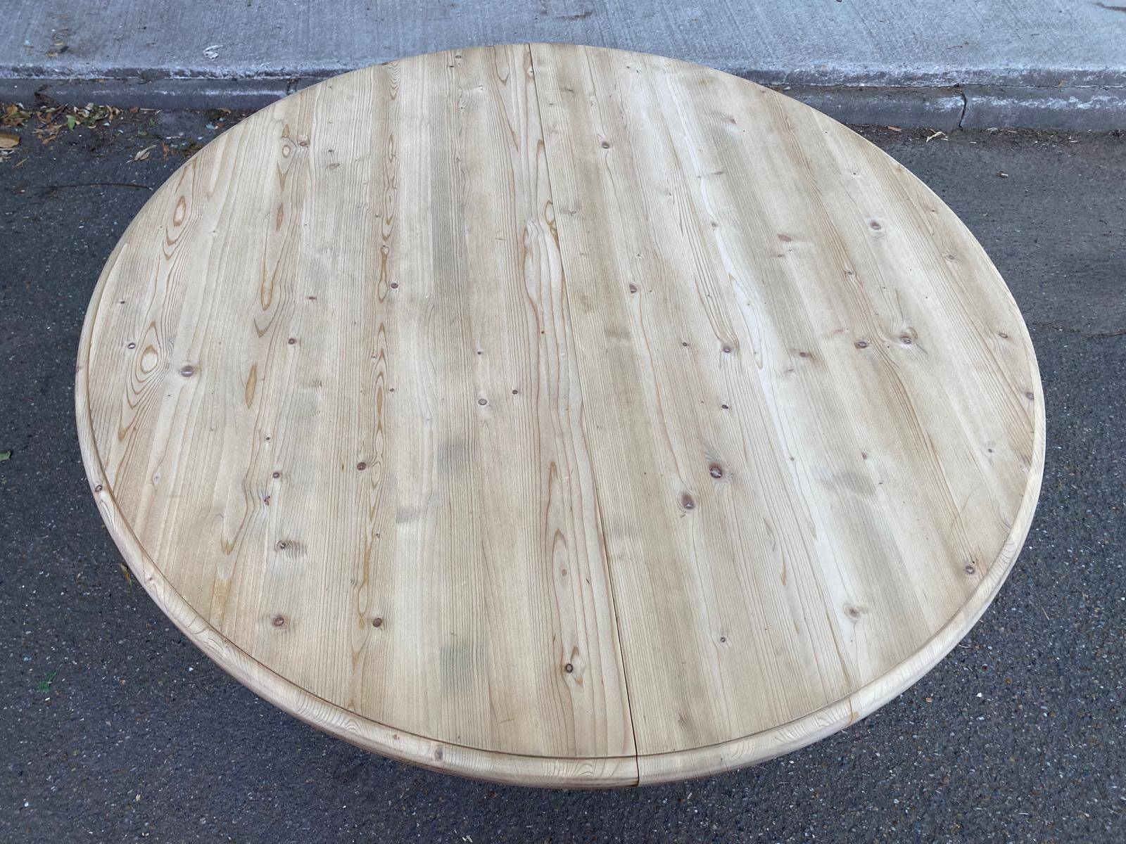 Interior's extendable round tripod dining table renovated in solid wood