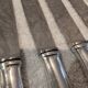 12 silver-plated metal table knives, Platil rocaille silversmith design, 24.6cm