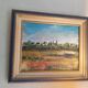 Oil on canvas "a Village in Brittany" signed by Raymond Scuiller
