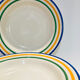 4 hollow faience plates with stripes made in Romania