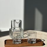Trio of rounded rectangular trays or cups in monoxyl teak L:35