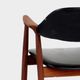 Set of two cowhorn desk arm chairs in black leatherette with teak frame, 1960s