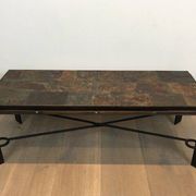 Rare coffee table in steel and wrought iron with a top made of lava stones