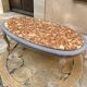 Oval coffee table in marble and wood