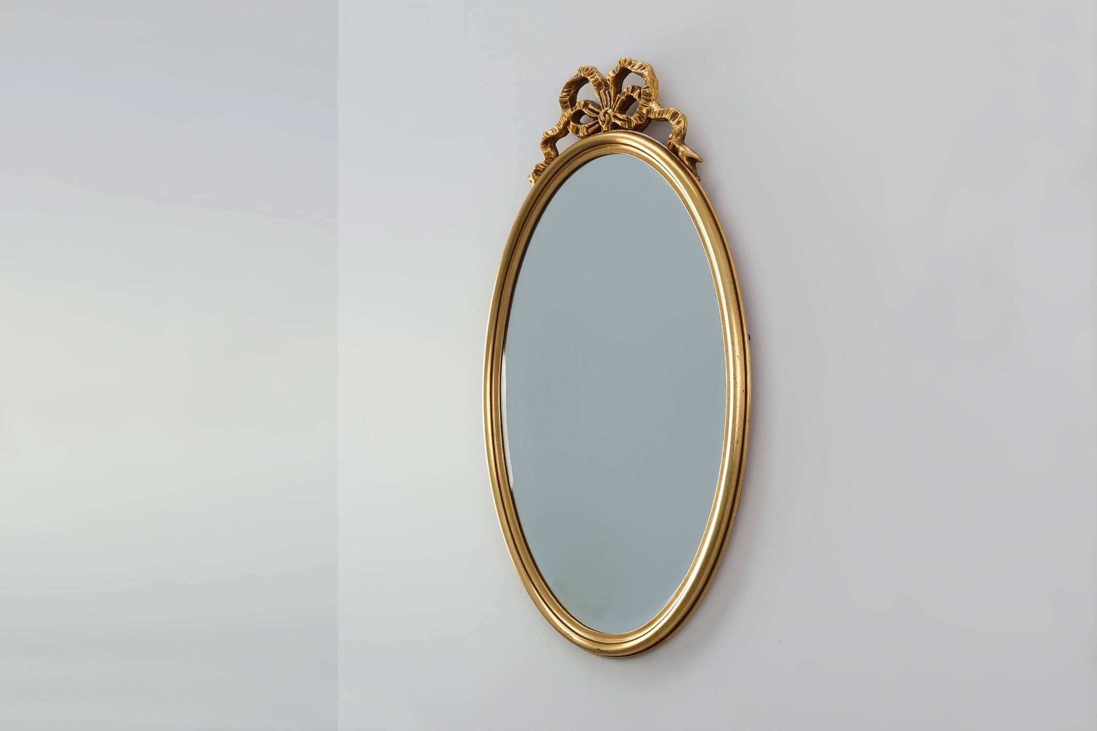 20th century Louis XVI style mirror in gilded wood, France