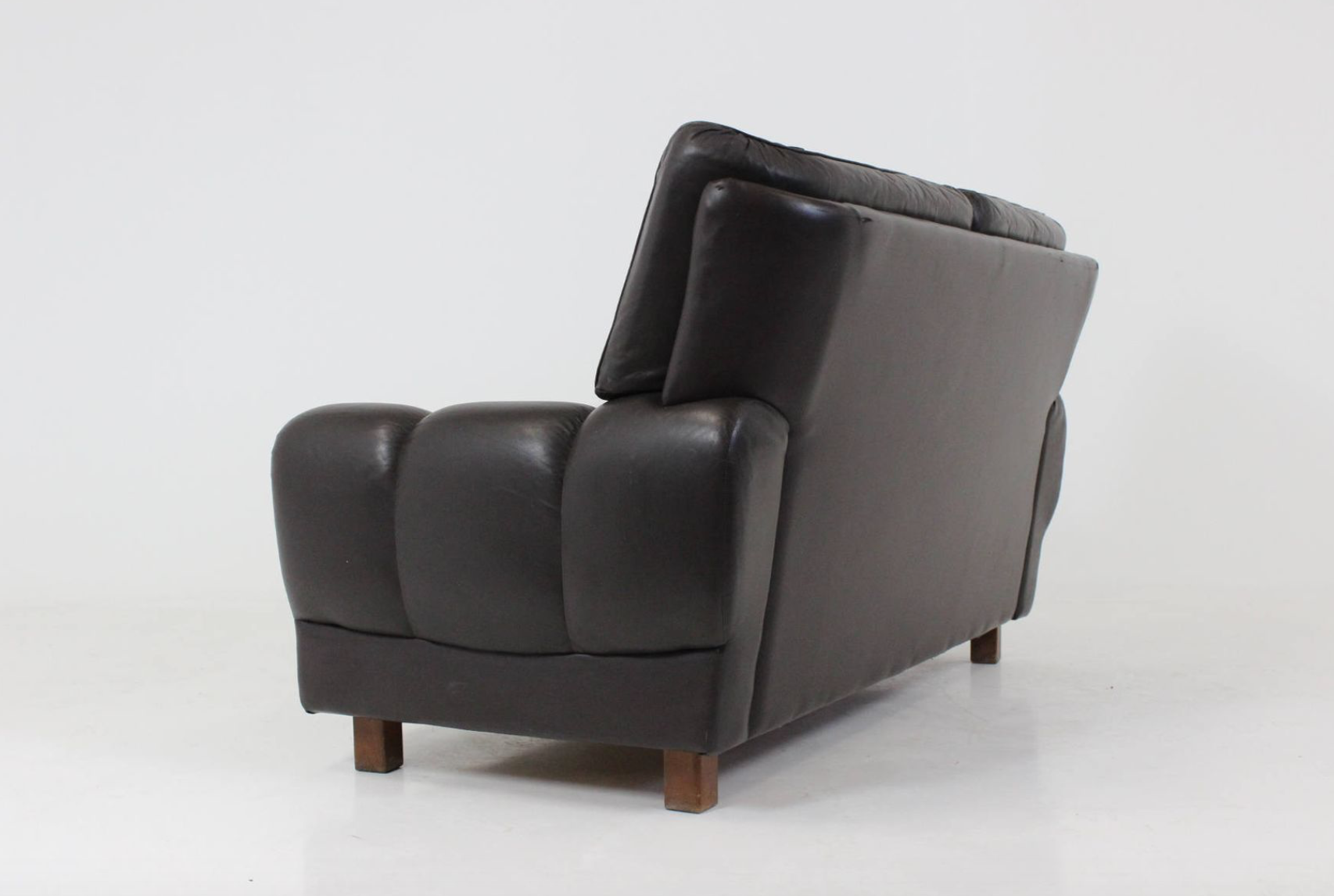 Mid-century black leather sofa