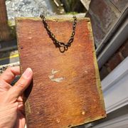 Small vintage mirror in gilded wood, bevelled glass with chain.