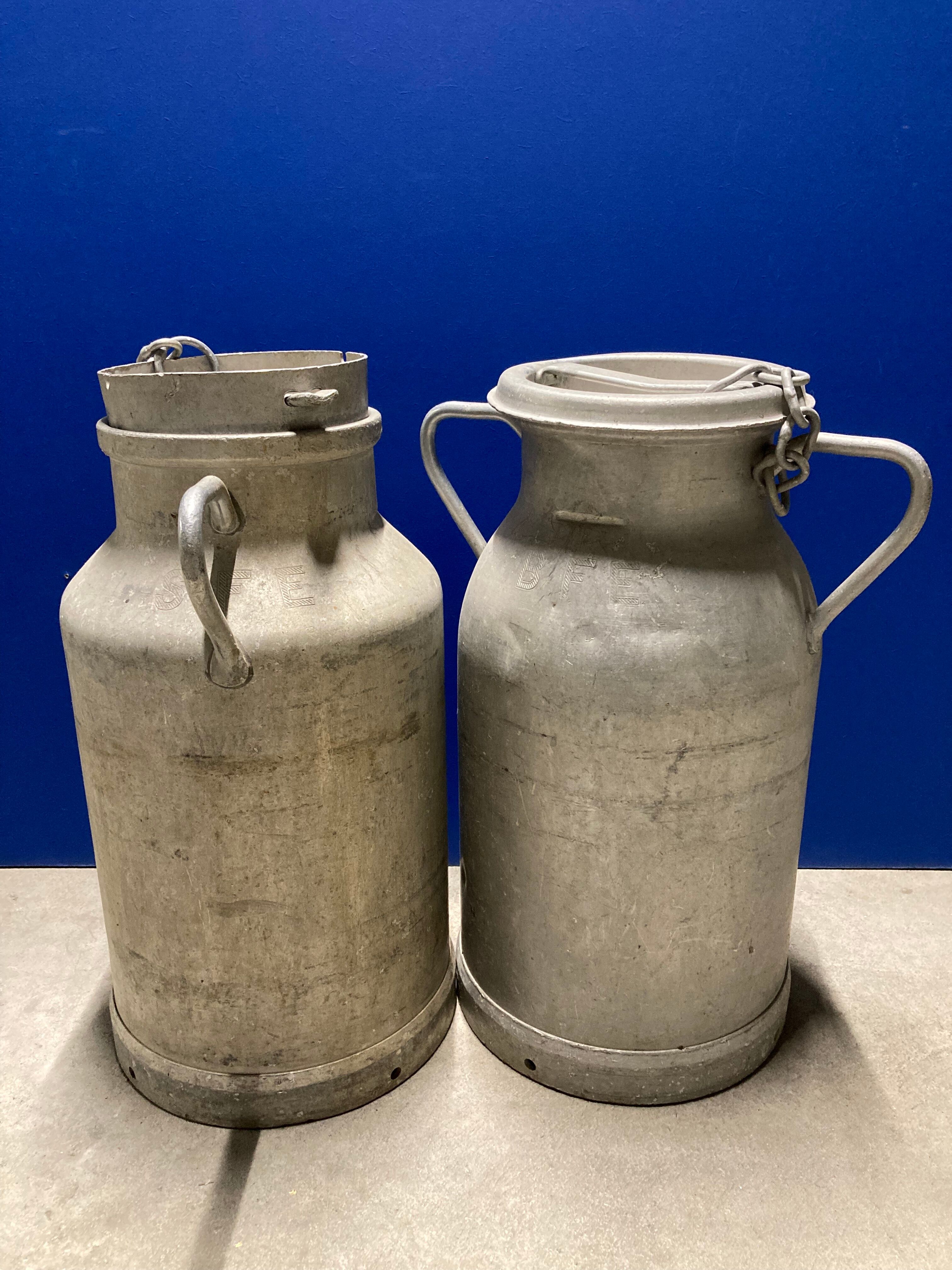 Pair of farm milk jars aluminum cans