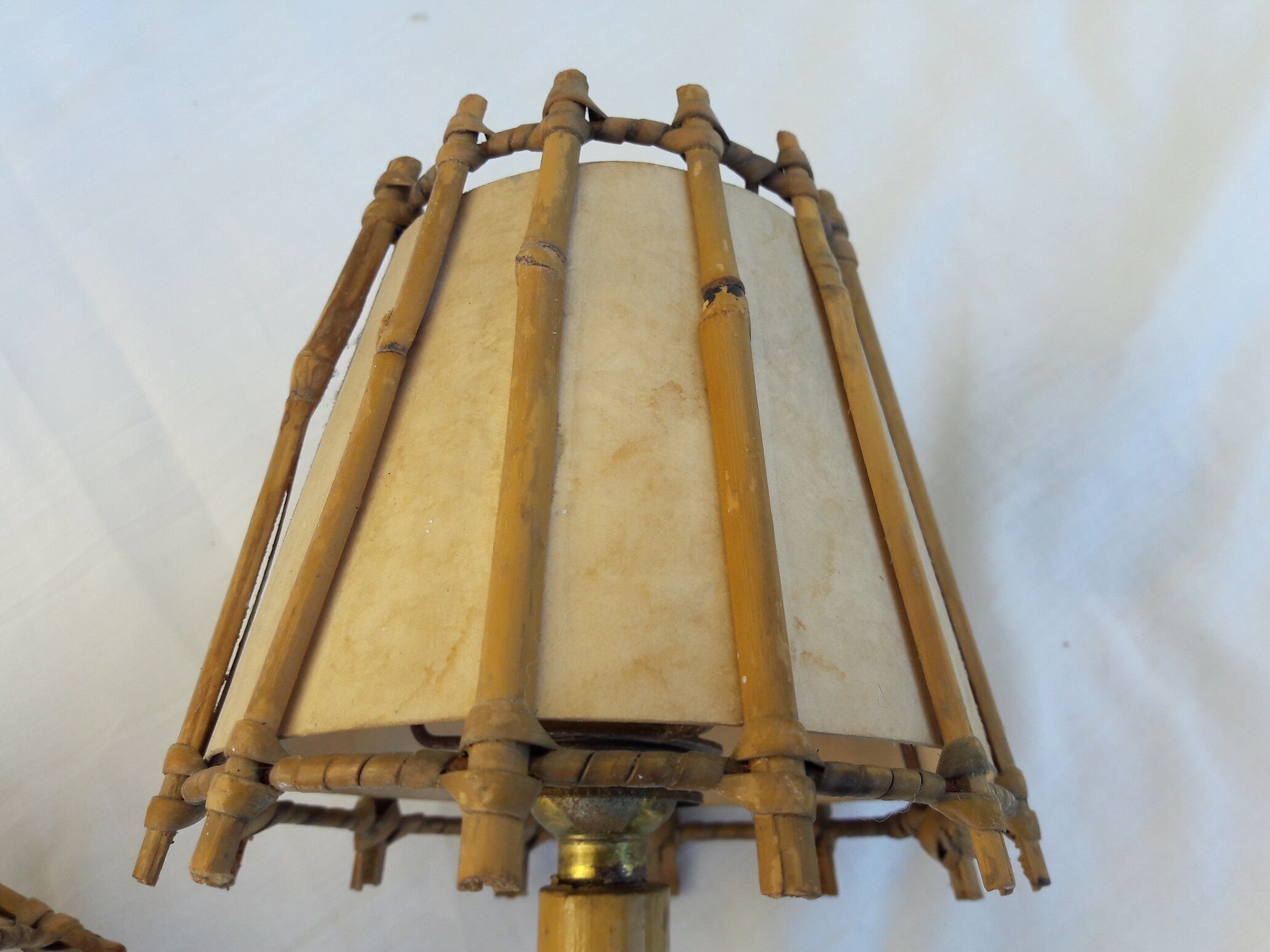Double rattan sconce