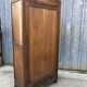 Parisian Bonnetiere armoire from the 1900s in solid chestnut.