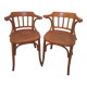 Curved wooden armchair
