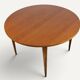Round extendable dining table in teak – 1960s