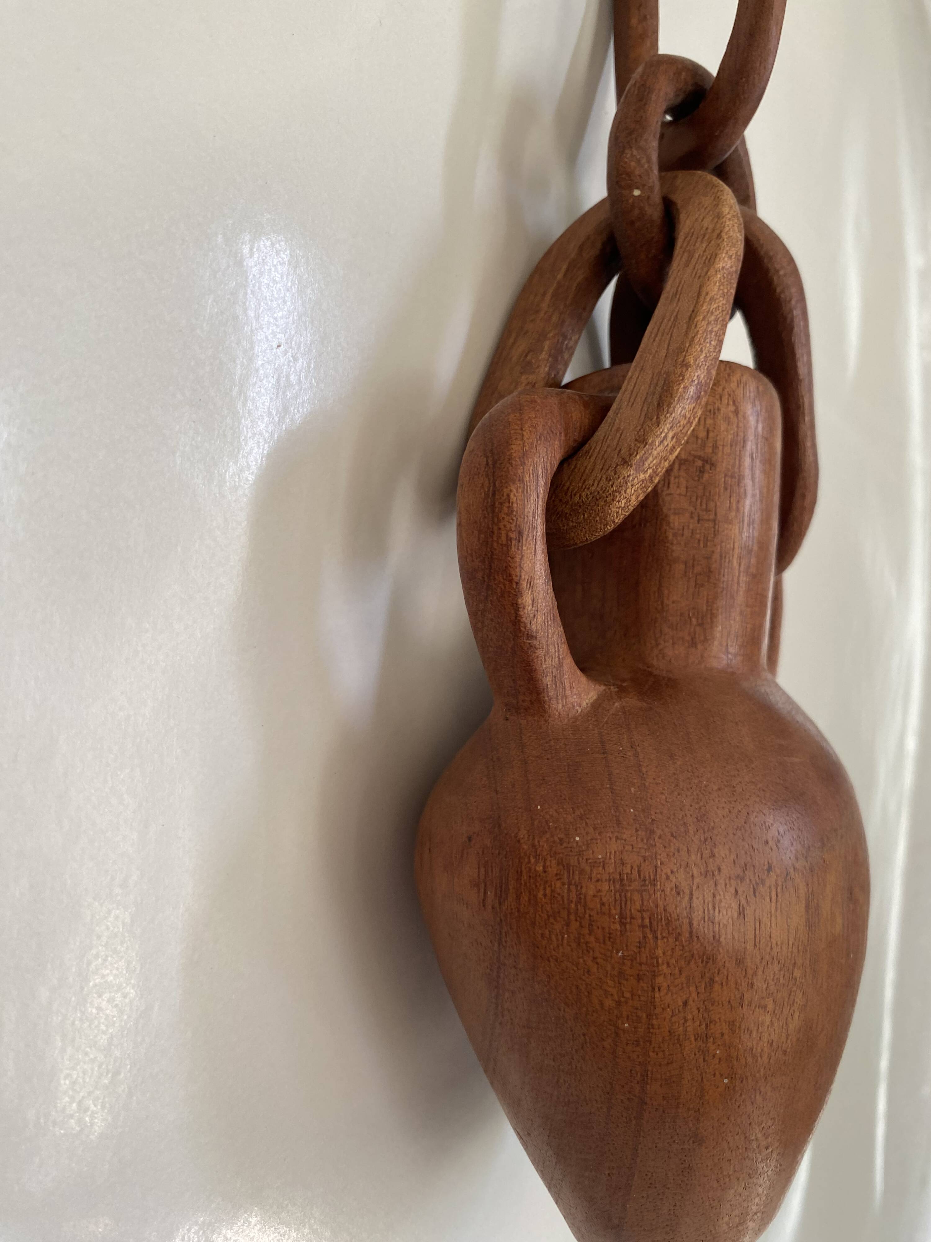 Vase and wooden chain to hang
