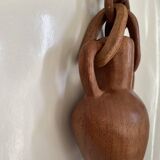 Vase and wooden chain to hang