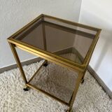 Brass rolling trolley with smoked glass from the 70s
