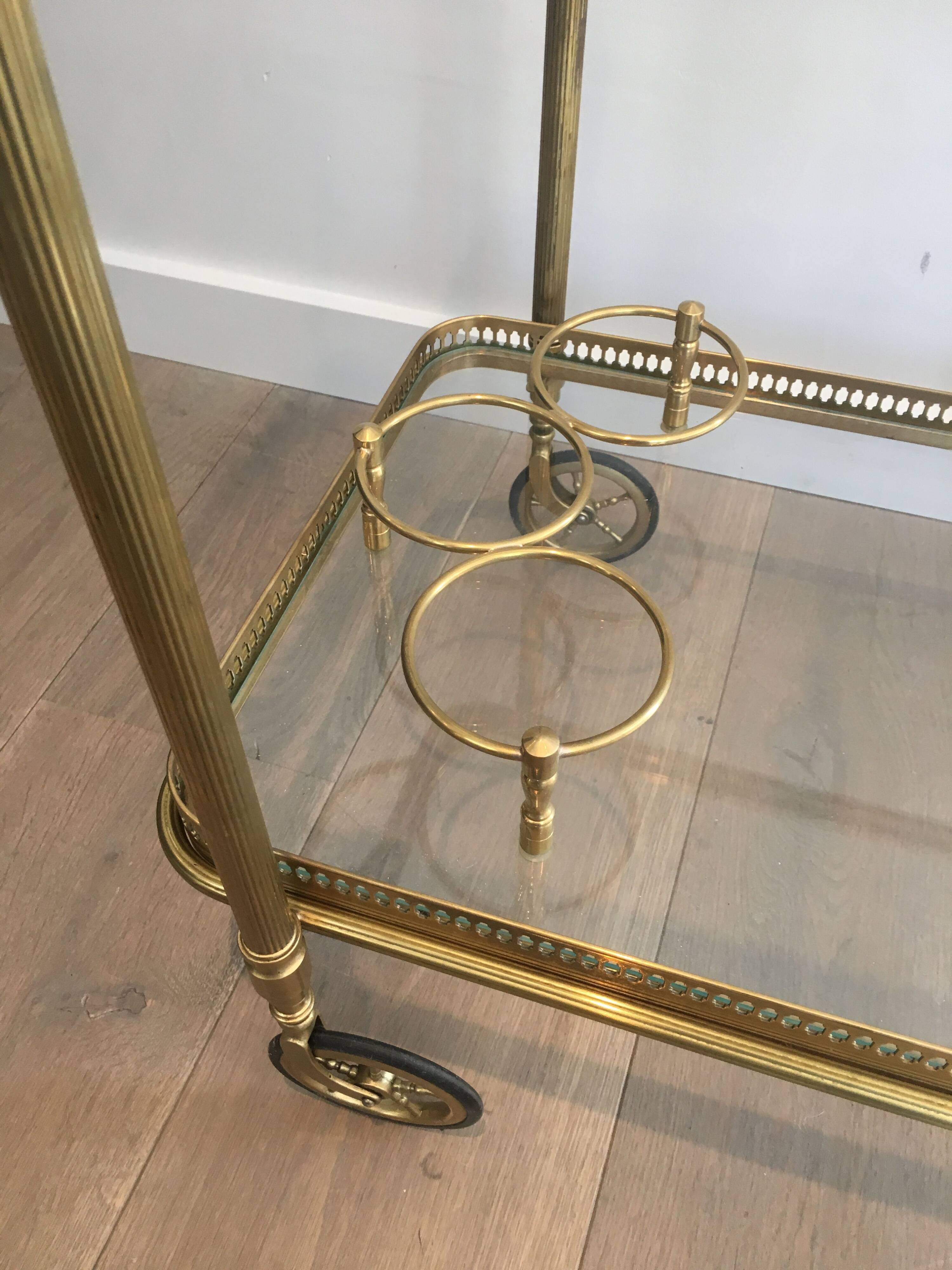 Neoclassical brass rolling table from Maison Baguès