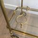 Neoclassical brass rolling table from Maison Baguès