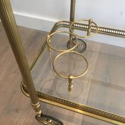 Neoclassical brass rolling table from Maison Baguès
