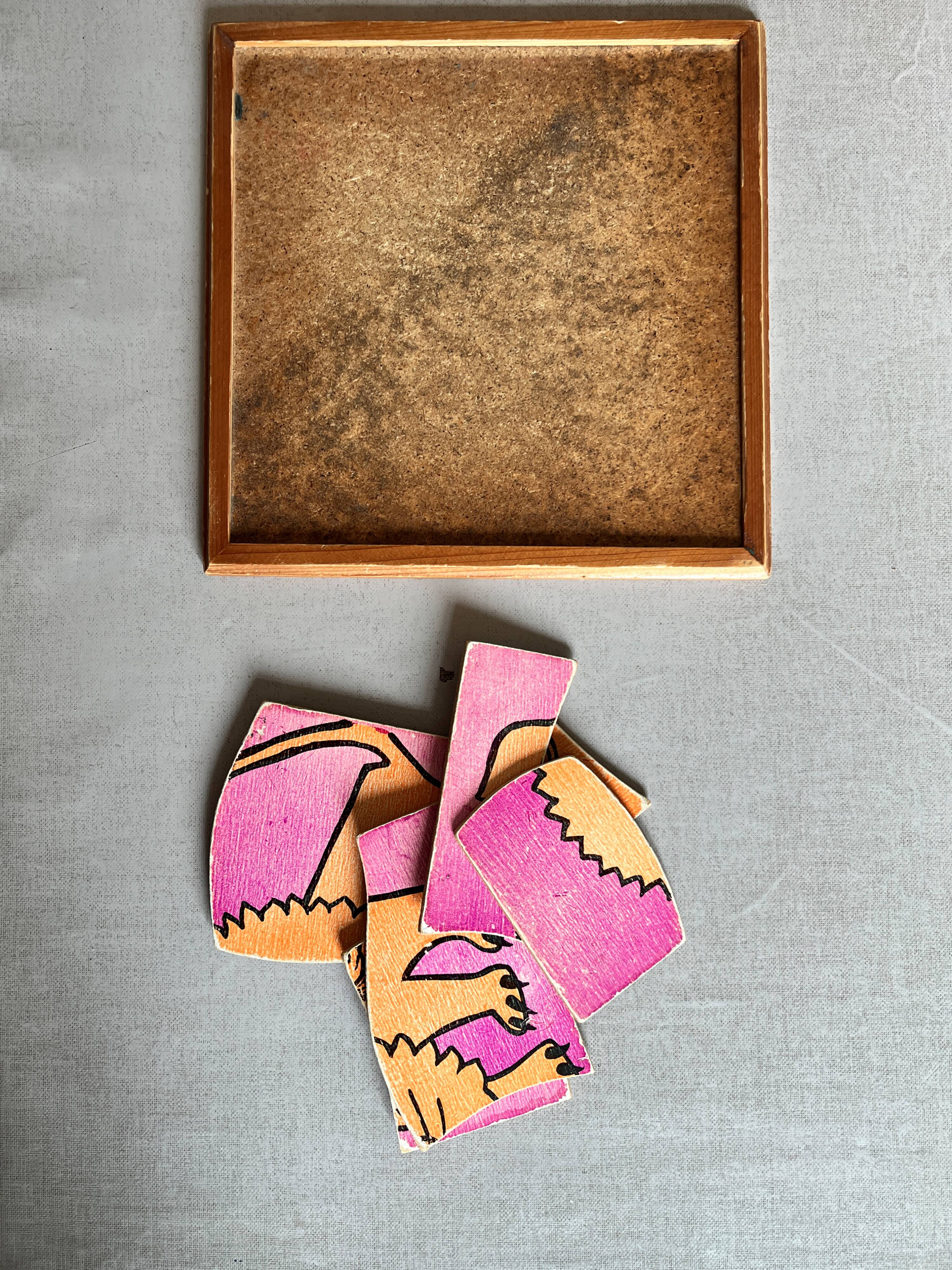 Wooden frame puzzle from the 1960s depicting a lion.