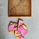 Wooden frame puzzle from the 1960s depicting a lion.