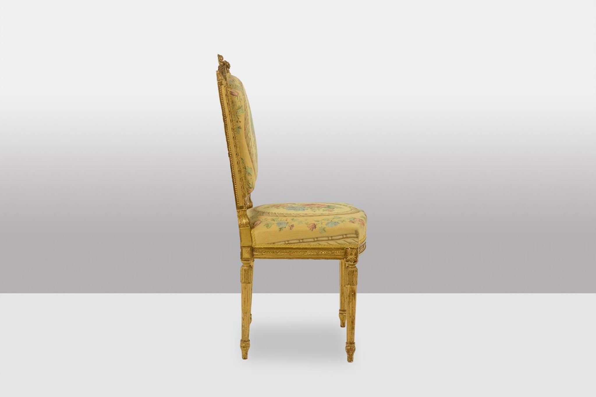 Pair of gilded wooden chairs with upholstery. Louis XVI period.