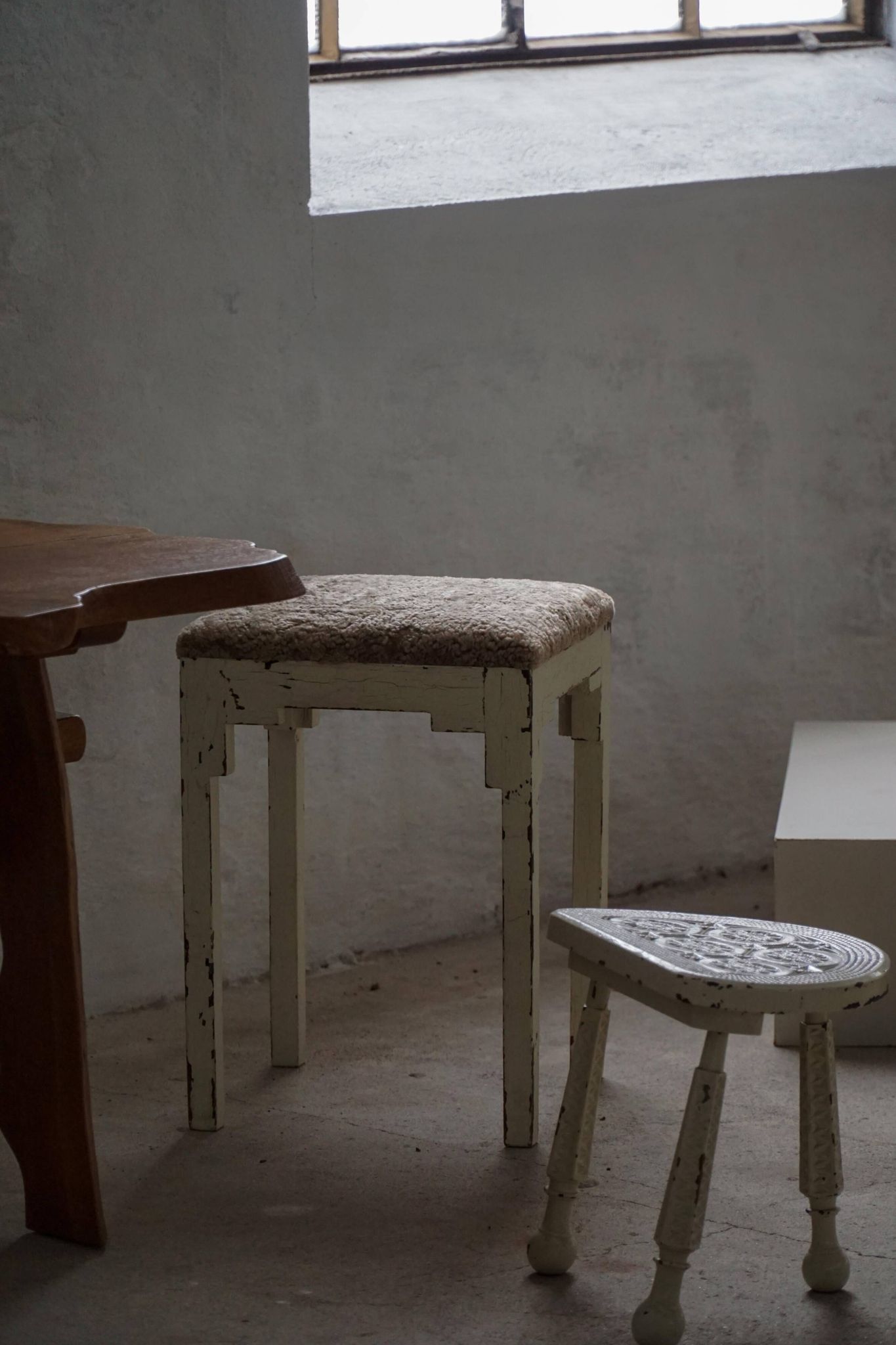 A pair of antique Danish stools, seats in lambswool, late 19th century.