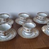 Set of 11 cups and saucers