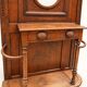 Napoleon III entrance hall wardrobe in solid oak with bevelled mirror.