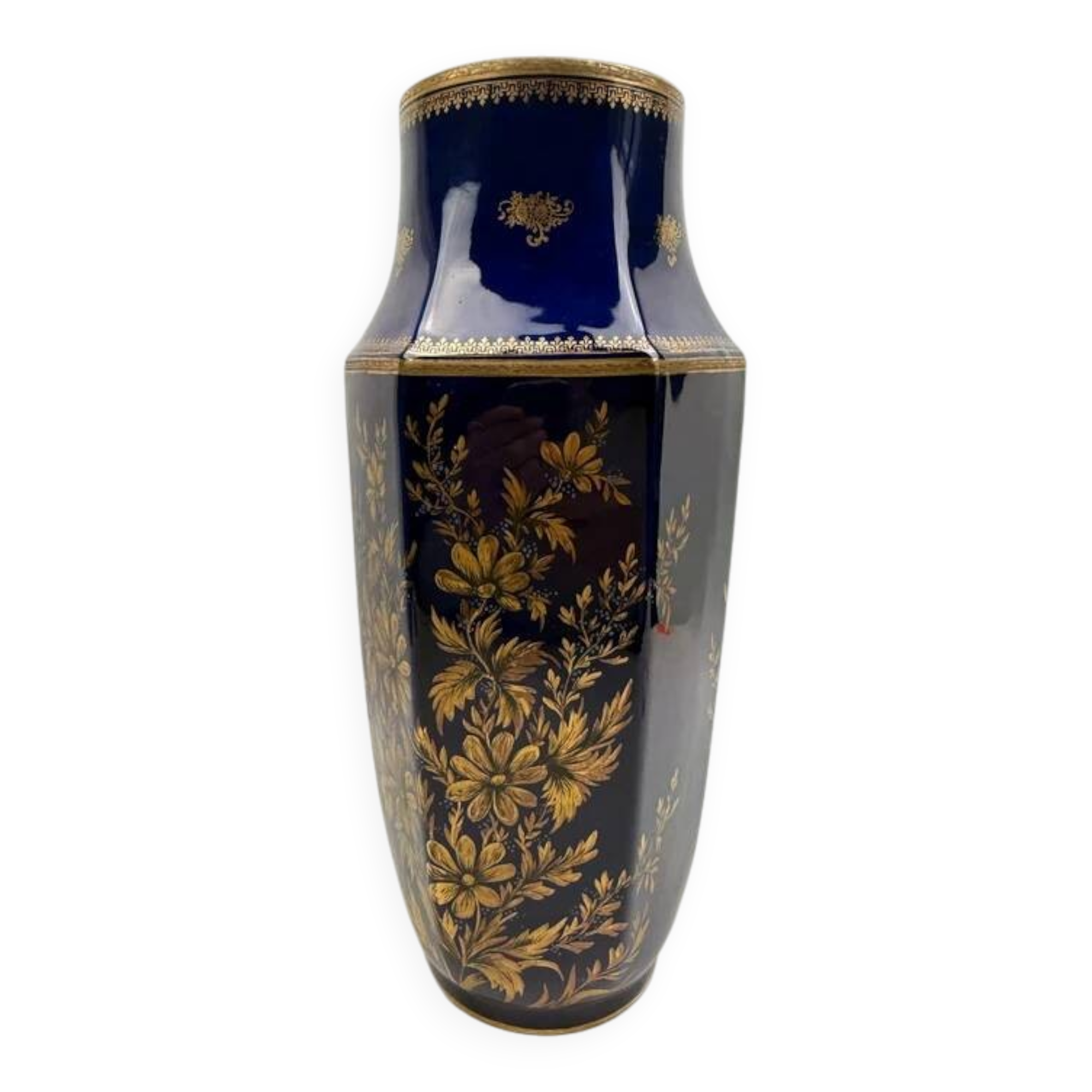 Octagonal vase in Limoges porcelain, oven blue and gold decoration, 20th century