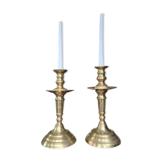 Pair of antique Moroccan brass candlesticks.