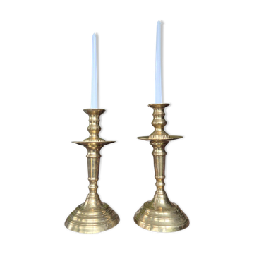 Pair of antique Moroccan brass candlesticks.