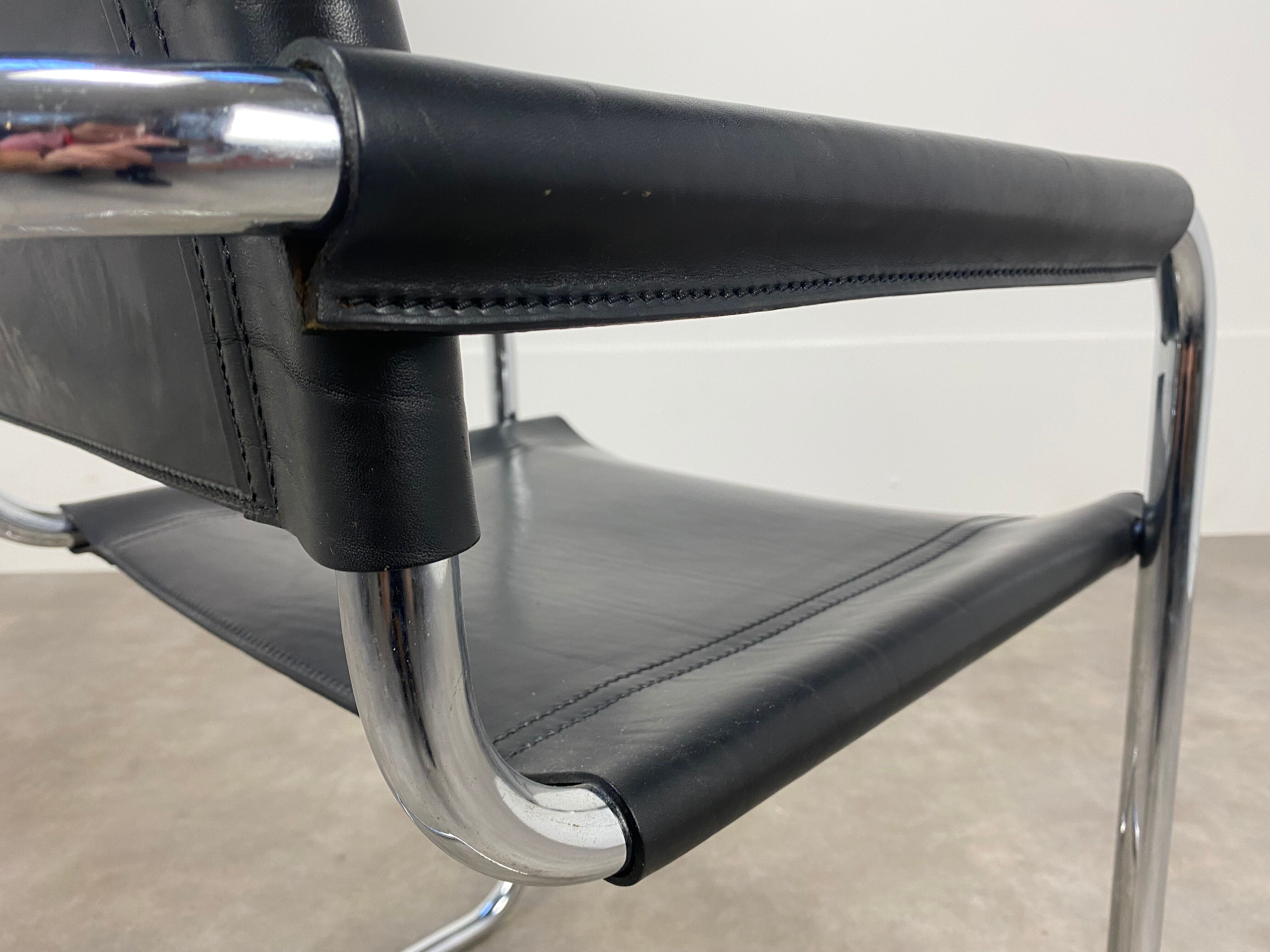 Black and chrome leather cantilever armchair