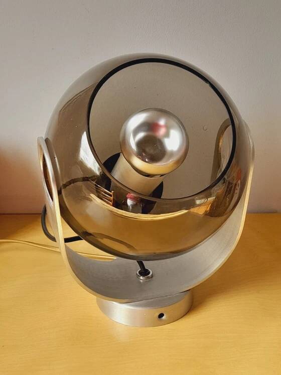 Space age lamp in chrome metal and smoked glass from the 1970s.