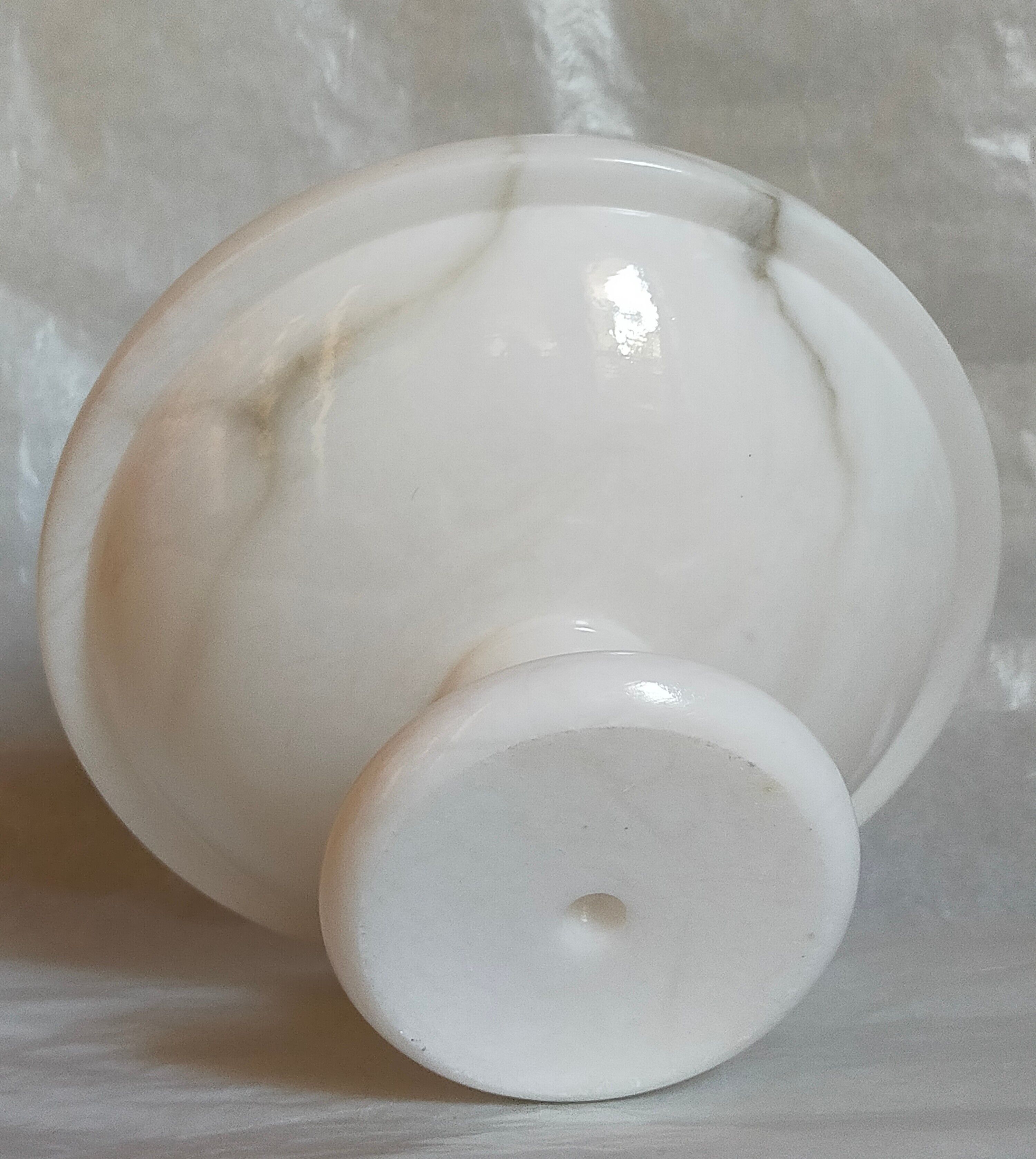 Standing cup in old white marble