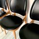 Lot de 4 chaises vintage "Pégase" – design Baumann, bois clair & skaï